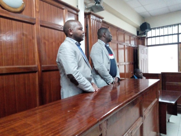 National bank employees charged for making false entries of millions of shillings