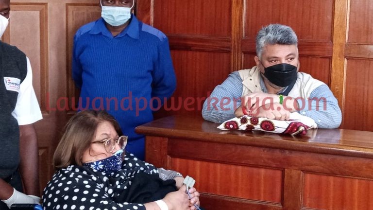 Businesswoman appears in court in wheelchair, oxygen tank after arrest warrant was issued